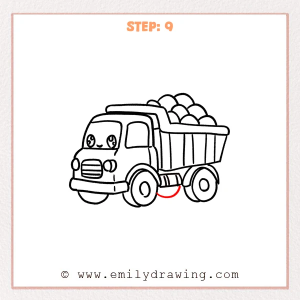 how to draw a dump truck - Step 9 adds the dump truck’s rear wheel under the bed, with an inner hub circle and a small curved detail for tire depth.